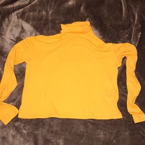 Yellow turtleneck shirt